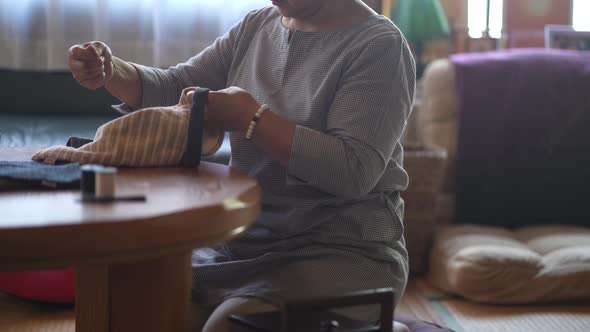 woman making a bag