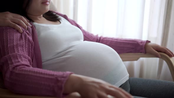 Pregnant Couple Feels Love and Relax at Home