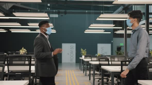 Indian Man Meet Worker African Businessman Wear Medical Face Masks Greeting in Office Workspace Hall