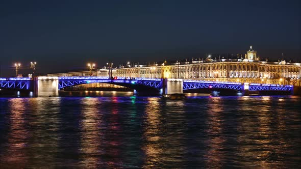 Night Traffic And Palace Bridge Of St. Petersburg