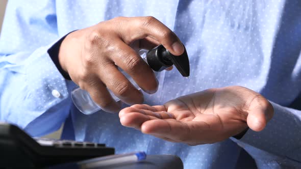 Businessman Using Sanitizer Gel for Preventing Virus 