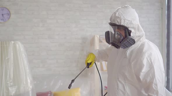 Close Up of the Exterminator Cleans with a Spray