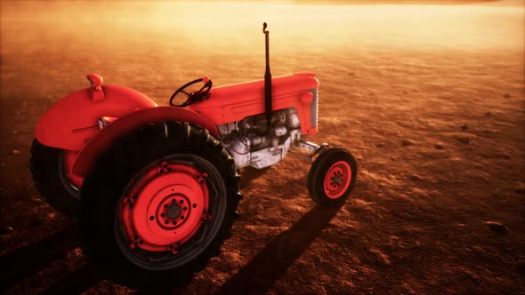 Vintage Retro Tractor on a Farm in Desert