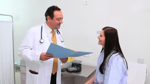 Doctor and patient talking together