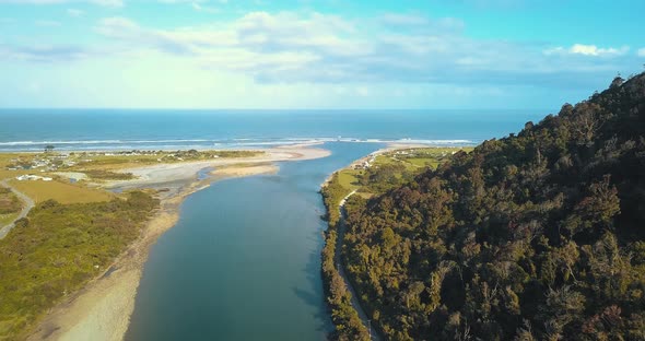 Drone View From Above of Mokihinui River and the Pacific Ocean in New Zealand  with Gentle Annie's C