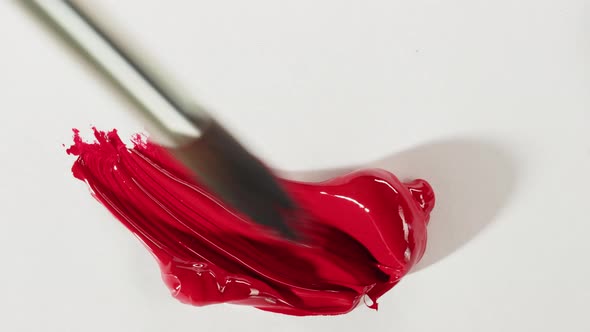 Mixing Red Paint Closeup