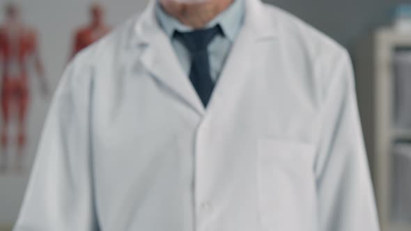 Close Up of Doctor Hand with Test Tube with Blood Sample for Analysis