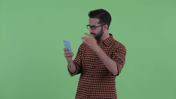 Happy Young Bearded Persian Hipster Man Taking Selfie