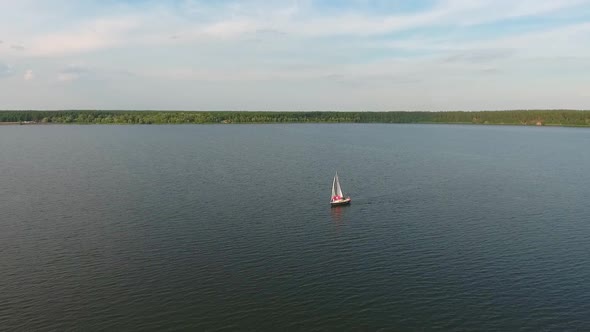 River Landscape with Sailing Boat Floating on Water