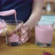 Transfers Strawberry Pudding to Serving Glasses - VideoHive Item for Sale
