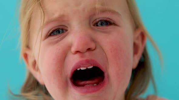 Oneyearold Baby Cries Closeup