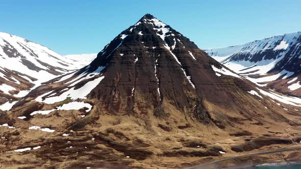 Drone Towards Majestic Mountain With Snow