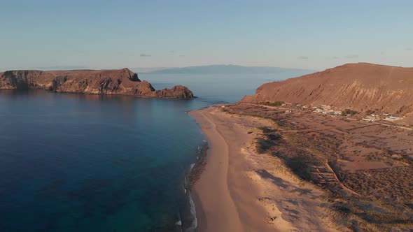 Beuty of nature of Matadouro beach at sunrise in Portugal. Aerial forward