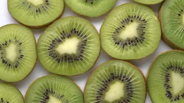 Kiwi Slices Closeup, Macro Food Summer Background, Fruits Top View. Rotate