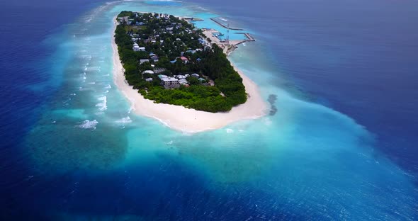 Natural birds eye travel shot of a summer white paradise sand beach and aqua blue ocean background i