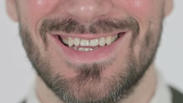 Close Up of Smiling Mouth of Man White Screen