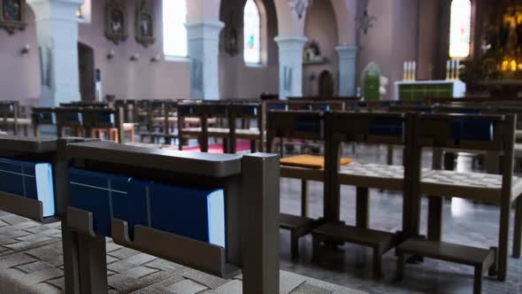 Empty Catholic Cathedral Inside Wooden Benches for Prayers Church Interior