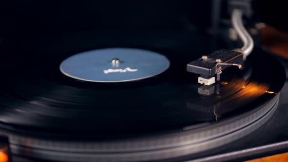 Turntable with a Vinyl Disc Stops Playing