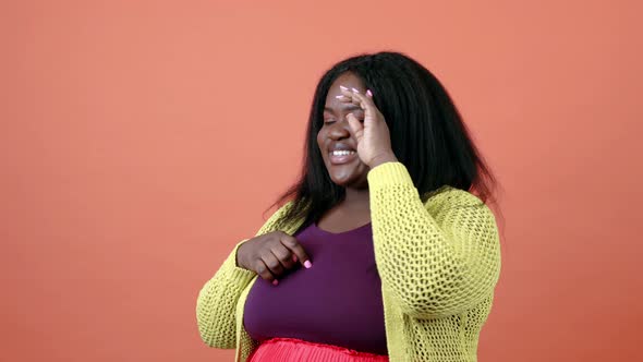 Plus size woman on colored background