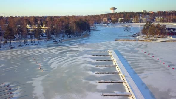 An Aerial Close Up Look of the Frozen Water on the Port of Finland