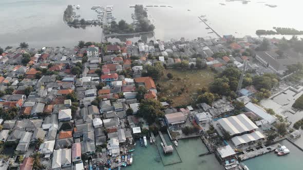 Cinematic overhead aerial view of Harapan island in seribu islands, Indonesia.
