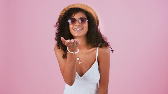 Afroamerican Lady in Sunglasses Hat Jewelry and White Dress