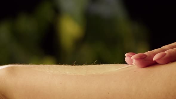 Woman Using Moisturizer Cream Closeup