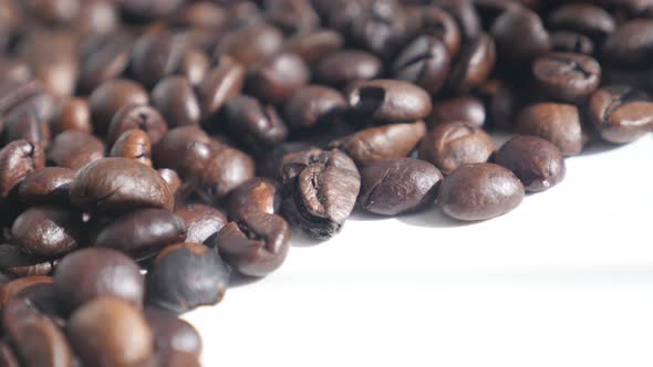 Coffee beans  on white background 4K slow pan footage