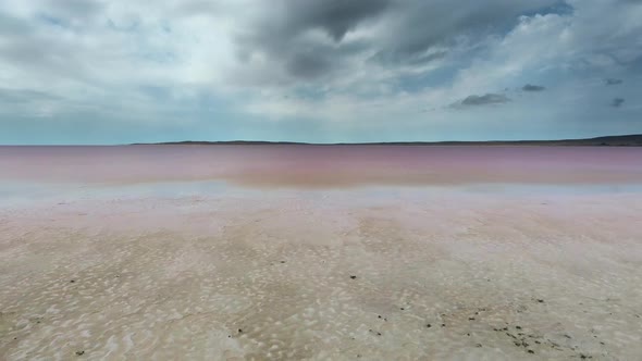 Aerial Pink Colored Salt Lake Shore