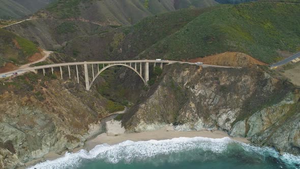 RV on Bixby Creek Bridge. Pacific Ocean. Big Sur, California, USA. Aerial View