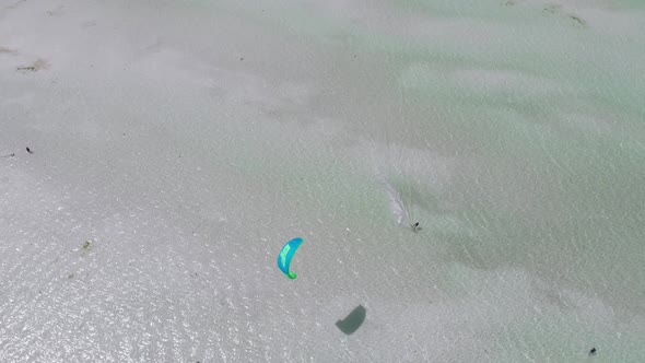 Kitesurfing on Tropical Beach in Turquoise Sea Water Paje Zanzibar Aerial View