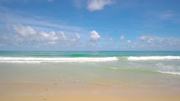 Phuket beach sea, View of beach sea on sun light in the summer. At Karon Beach, Phuket, Thailand. 4K