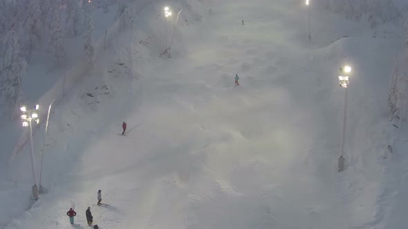 People Training on Slope for Mogul Skiing