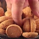 Hand taking a biscuit from a glass jar - VideoHive Item for Sale