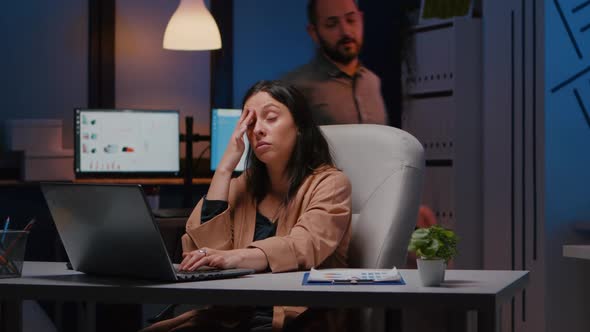 Overworked Exhausted Businesswoman Working in Startup Office Checking Management Strategy