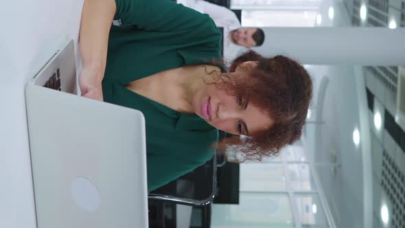 Vertical Screen Black Businesswoman Having Online Communication Via Laptop