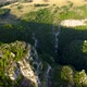 Aerial view of karst landscape, with valleys and cliffs, at sunset - VideoHive Item for Sale