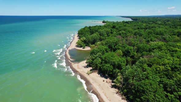 Spectacular Aerial drone video footage of beautiful Lake Erie during summer on a sunny day