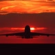 Silhouette of Large Passenger Airplane Taking Off Against Orange Sunset - VideoHive Item for Sale