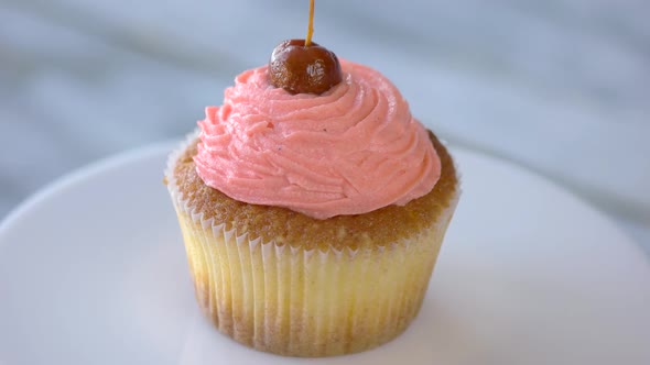 Cherry Cupcake with Cherry Frosting