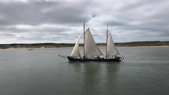 Sailboat passing by Vlieland island 