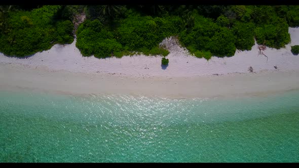 Aerial top view travel of tranquil bay beach voyage by aqua blue sea with white sandy background of 