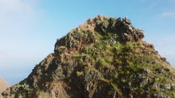 Drone Soaring Low Above High Mountain Peak Revealing Breathtaking Epic Kauai