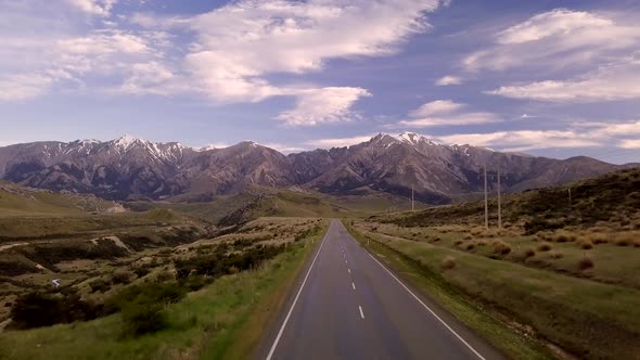 Empty road in mountains aerial