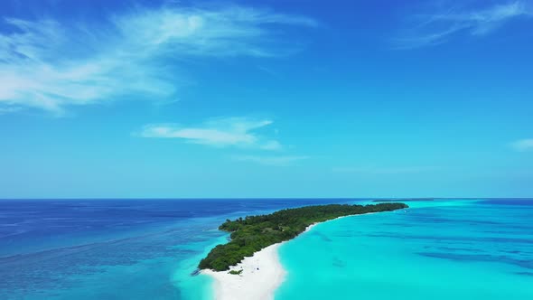 Luxury aerial copy space shot of a white paradise beach and blue ocean background in 4K