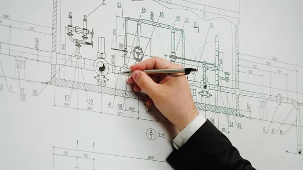 Architect Designer Working with Plan Blueprint Closeup