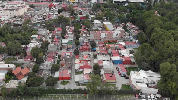 Aerial view of El Manantial in Peña Pobre neighborhood, southern Mexico City. Drone flying forward