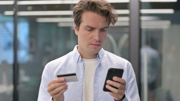 Portrait of Man Having Online Payment Failure on Smartphone