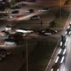 Night Shot of a Crowded Parking Lot Emptying Out After a Large Event - VideoHive Item for Sale