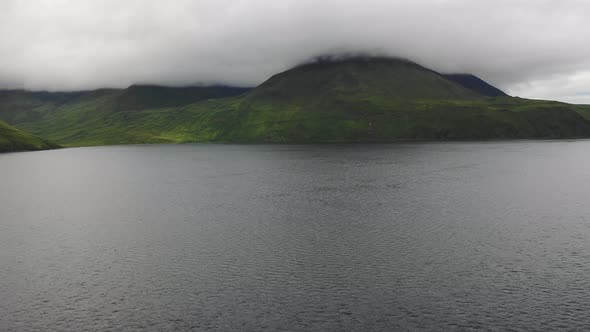 Aerial view of Unalaska Bay with fog, Alaska, United States.